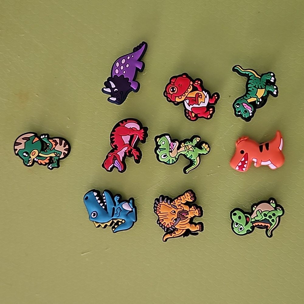 Set of 10 Dinosaur jibets for crocs.